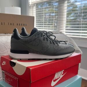 Nike Woman’s Charcoal and Black Sneakers